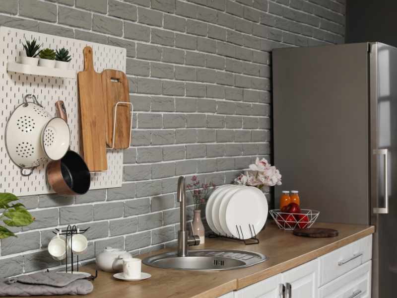 Pegboard Wall as ways to organize small kitchen